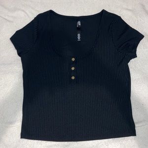 Am selling a black shirt with 3 buttons.